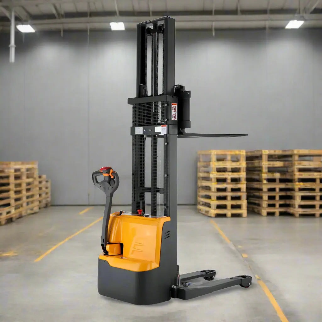 Yellow electric forklift in warehouse with stacked wooden pallets behind.