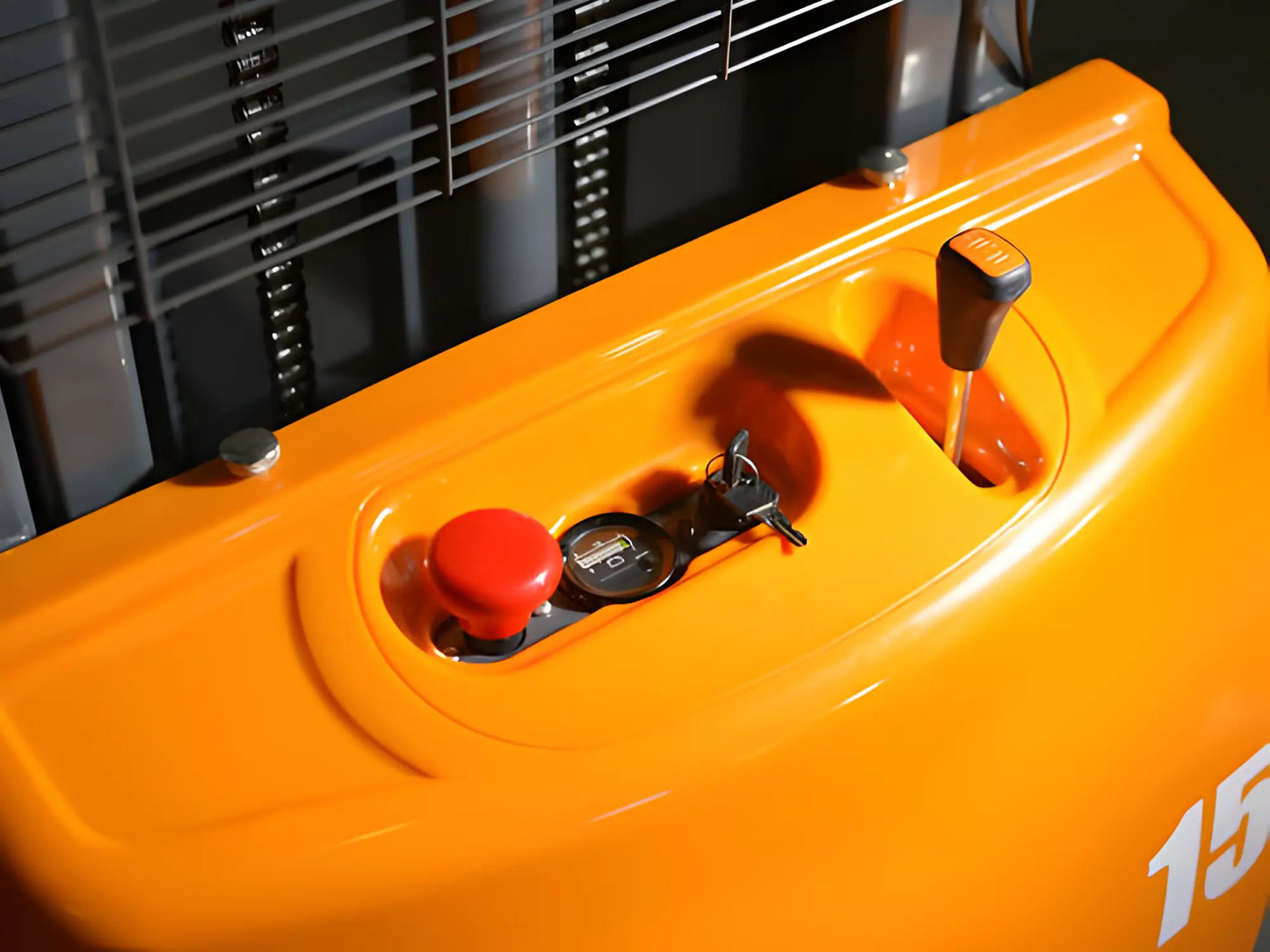 Close-up of EKKO EA15A forklift control panel with red emergency stop button and key ignition