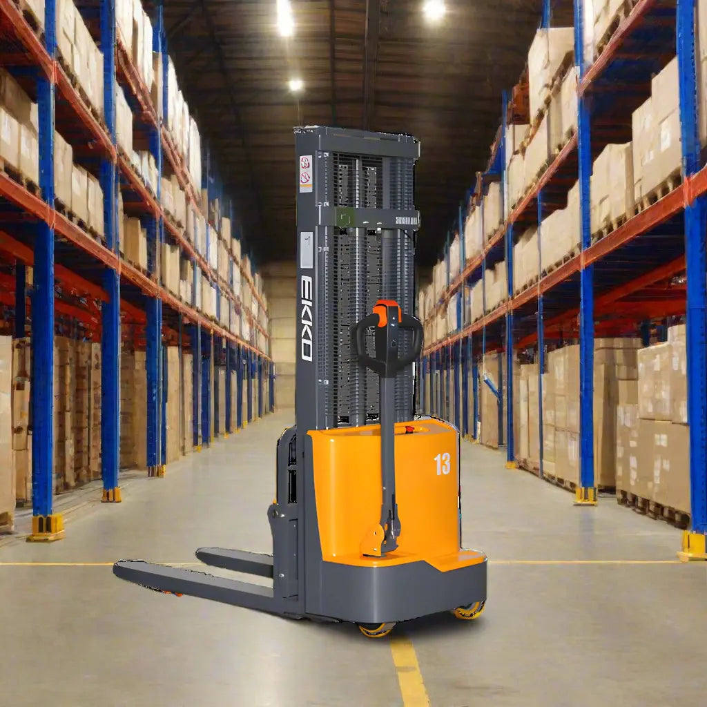 EKKO electric pallet stacker in a warehouse aisle lifting pallets with orange and gray design