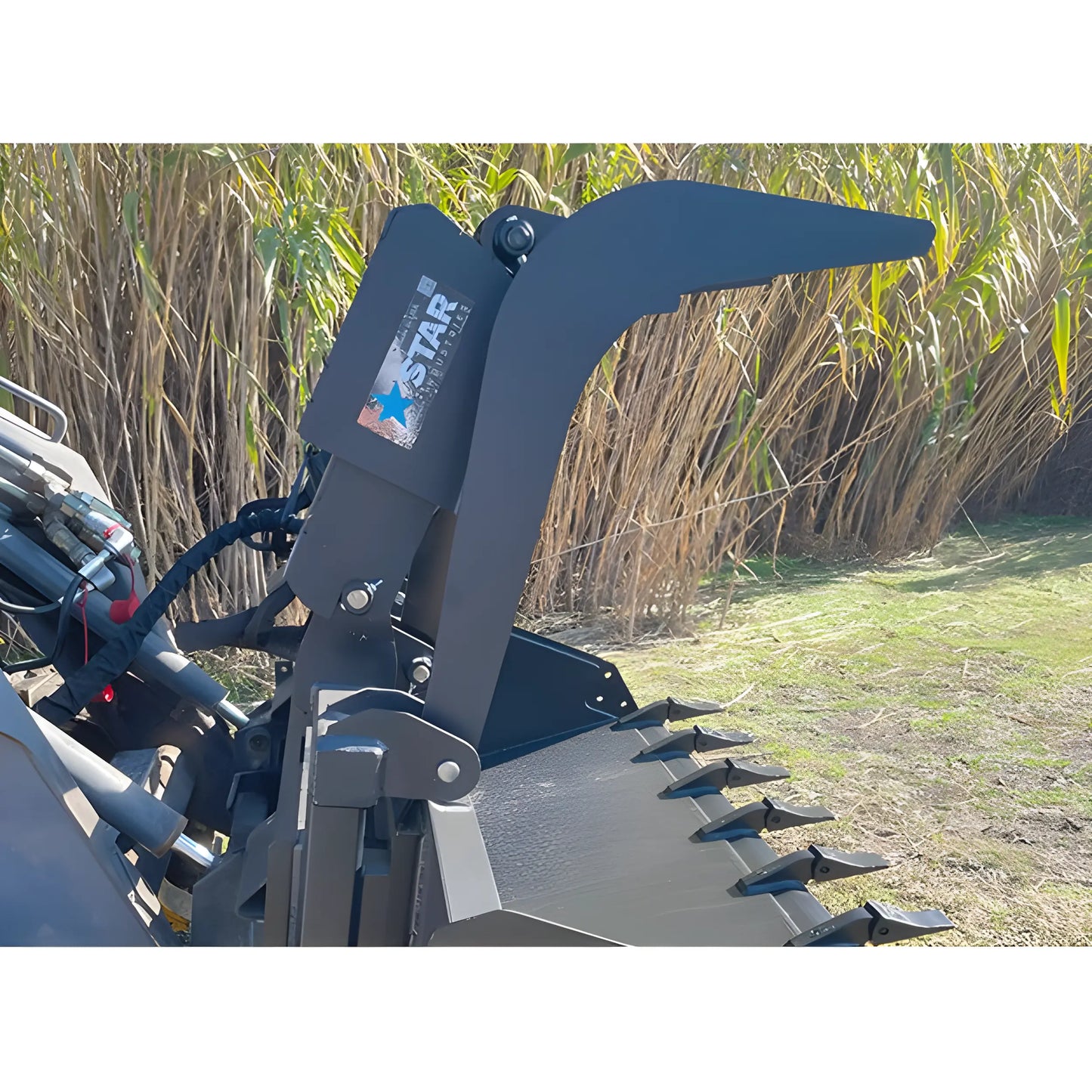 Star Industries 175-UGA heavy-duty grapple attachment on construction equipment in outdoor setting