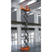 Ballymore drivable scissor lift in warehouse with worker operating elevated platform in orange