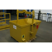 Yellow steel hopper with lifting handle placed indoors on a pallet.
