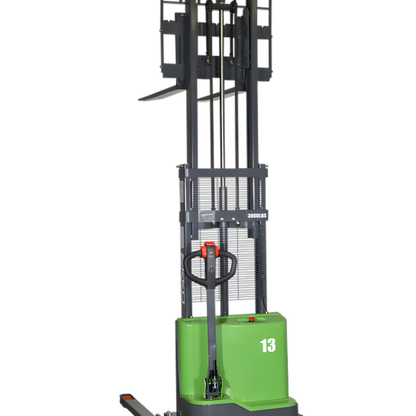 Front view of green EKKO straddle  stacker with raised forks.