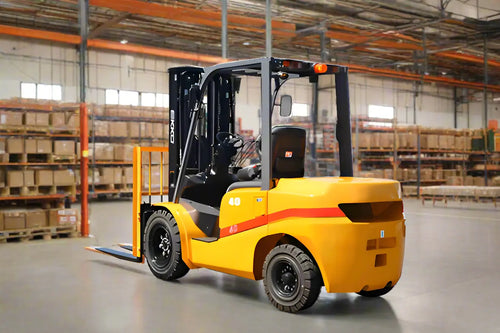 Yellow forklift parked in large warehouse surrounded by shelves and pallets.