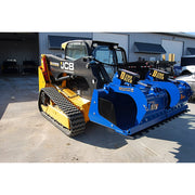 Demo-Dozer multi-use grapple bucket mounted on a compact track loader