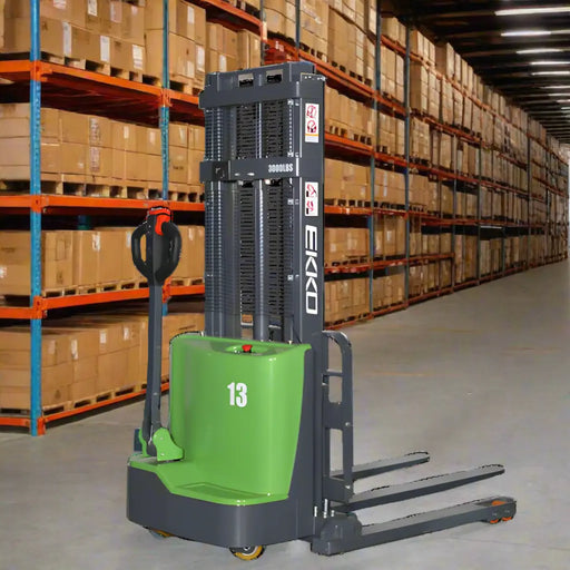 EKKO Electric Pallet Stacker in a warehouse with shelves of boxed goods in the background