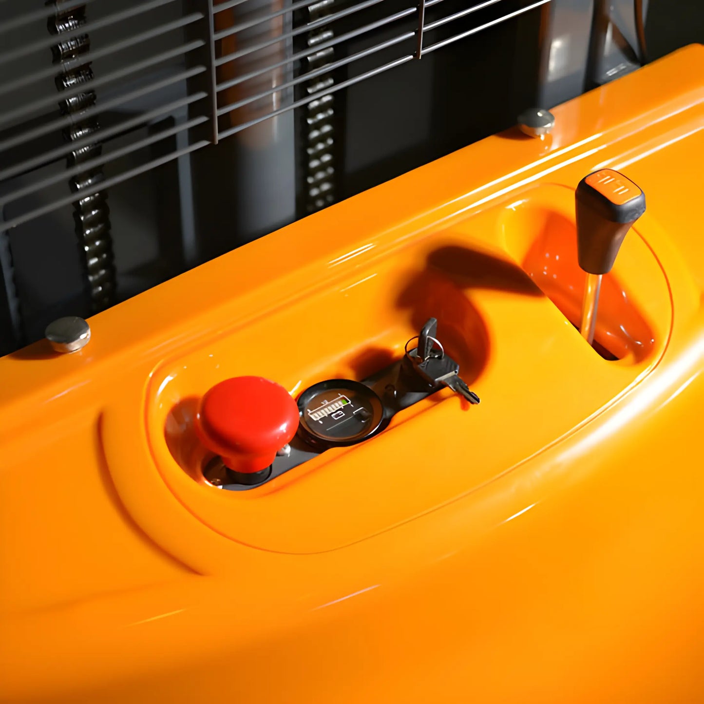 Close-up of orange control panel with red button and key ignition on EKKO EA15A-138 equipment