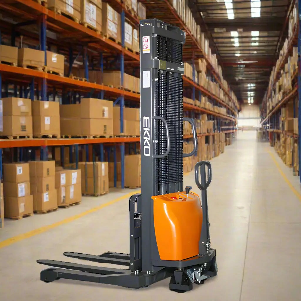 EKKO EA15A-138 electric pallet stacker with orange body in a warehouse aisle with shelves