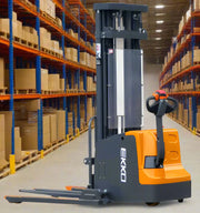 EKKO EB20E electric pallet stacker in warehouse aisle with orange and black design