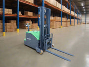 EKKO EK14C-130Li electric forklift in warehouse with stacked cardboard boxes on shelves
