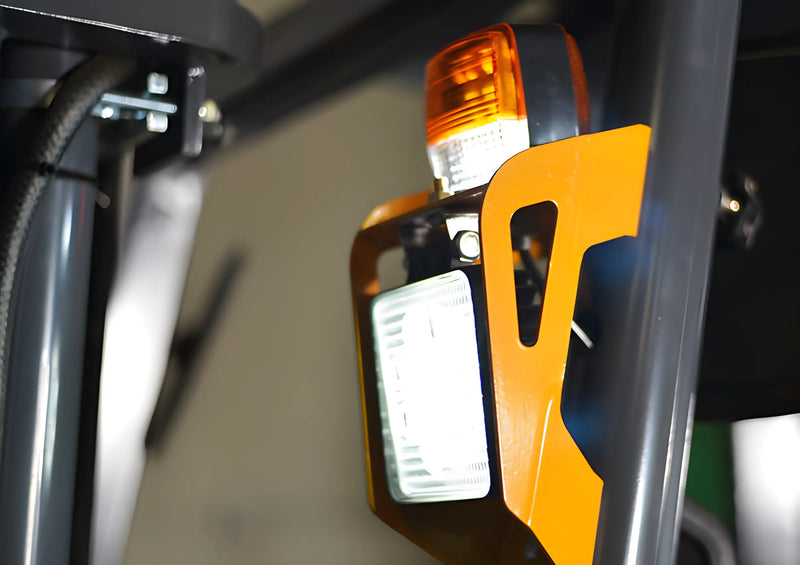Close-up of orange safety light and headlamp on EKKO Electric Forklift
