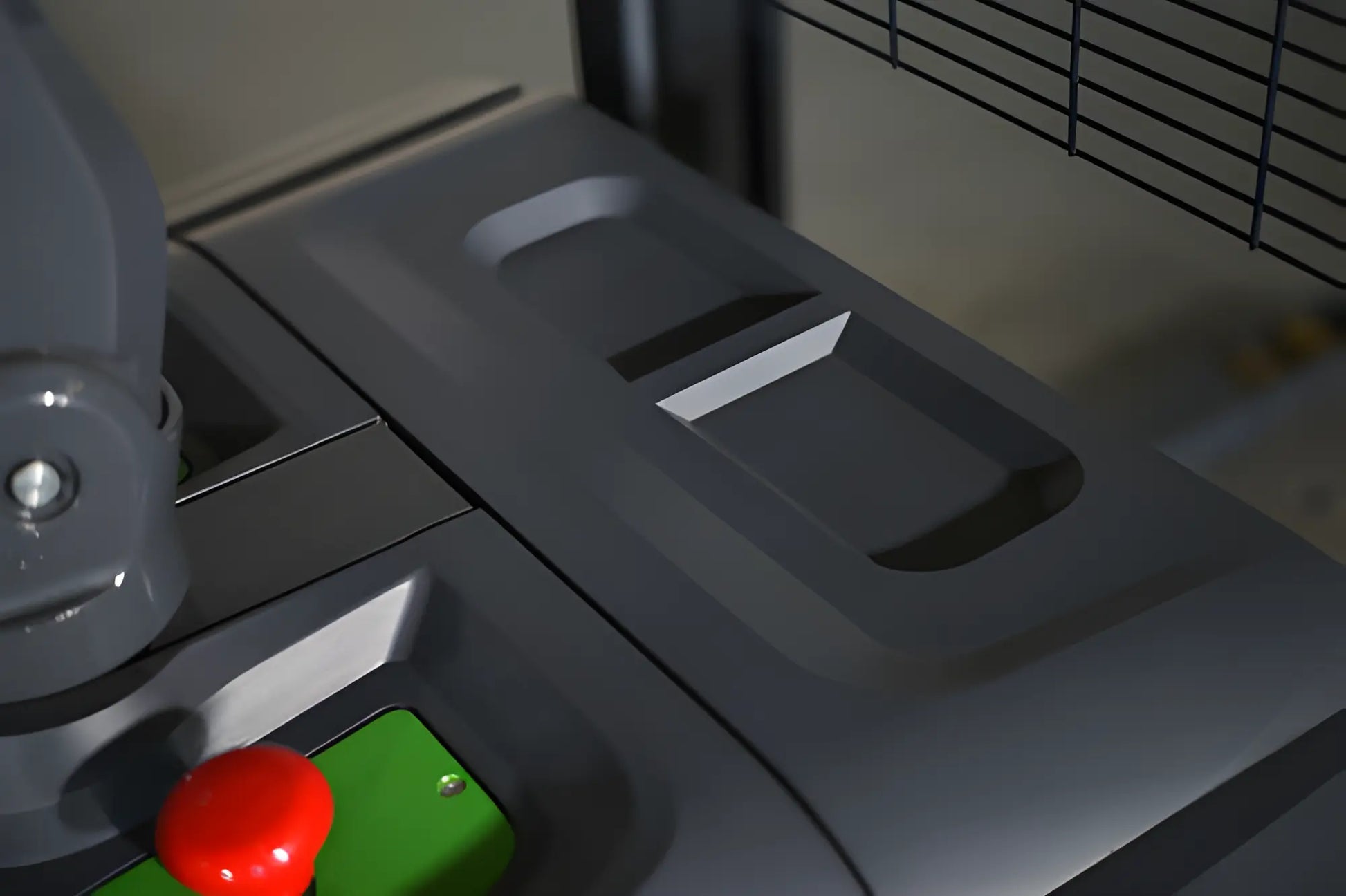 Close-up view of EKKO electric pallet stacker control panel with red emergency stop button