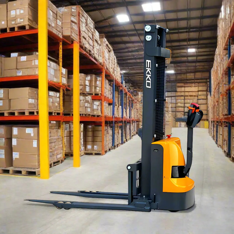EKKO Electric Pallet Stacker in warehouse aisle with shelves of boxed inventory