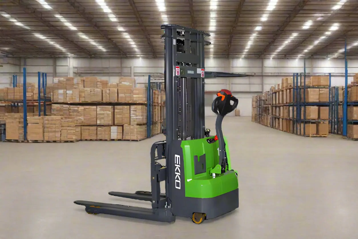 EKKO Electric Pallet Stacker in a warehouse with pallet racks and stacked boxes