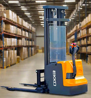EKKO Electric Pallet Stacker with orange and black design operating in a large warehouse aisle
