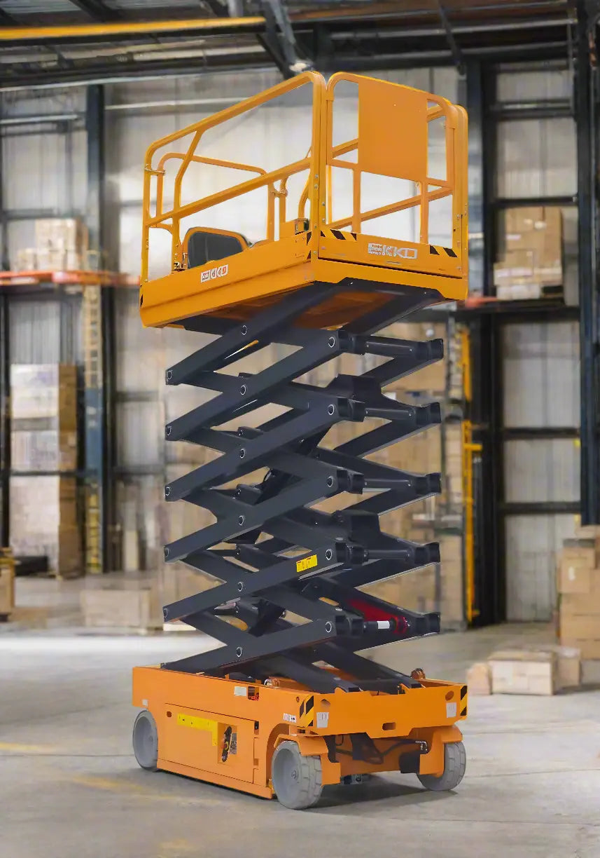 EKKO ES60E yellow scissor lift elevated inside warehouse with safety rails