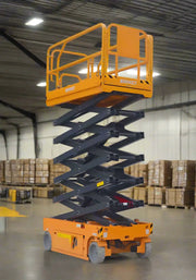 EKKO ES80E orange electric scissor lift with extended platform inside warehouse