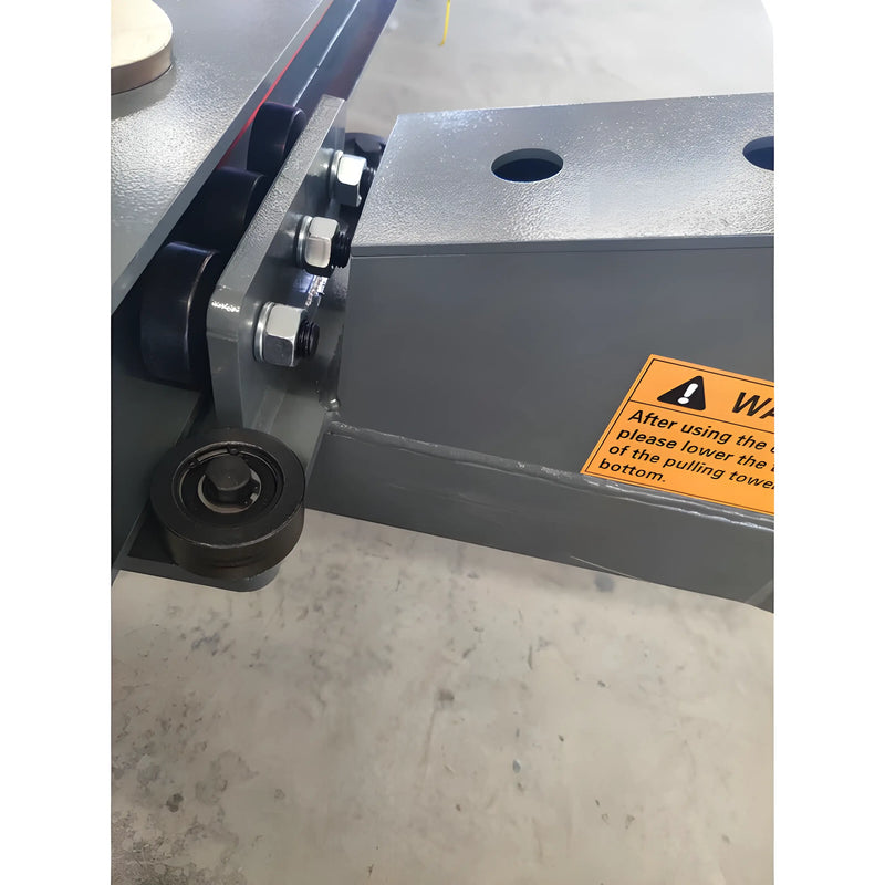 Close-up of Katool Auto Body Frame Machine showing the sturdy connecting joints and warning label