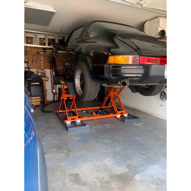Katool Electric Scissor Lift showcasing a black Porsche elevated in a garage for easy access