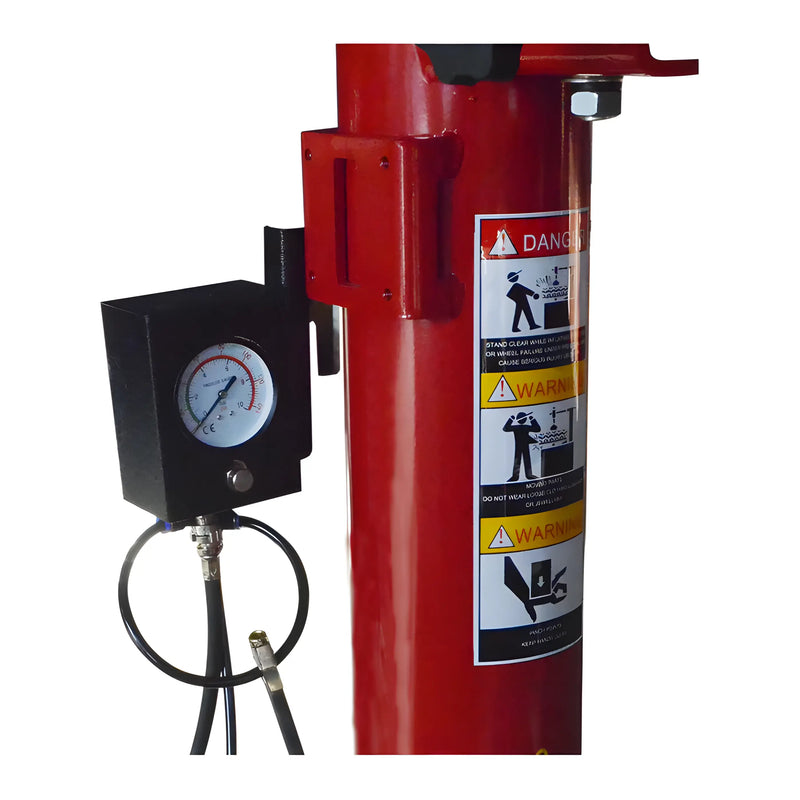 Close-up of Katool Tire Changer and Wheel Balancer with pressure gauge and safety warnings