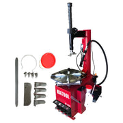 Katool Tire Changer with accessories for easy tire installation and removal in a garage setting