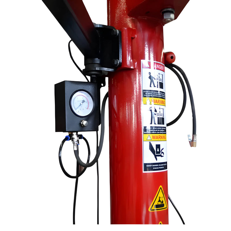 Close-up of Katool Tire Changer showing gauge and warning labels for safe operation