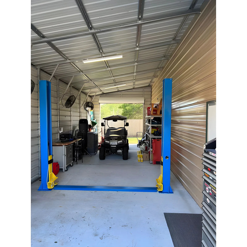 Katool Vehicle Lift in a spacious garage, ideal for maintenance and repairs of cars and equipment