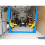 Katool Vehicle Lift in a garage with space for automotive repairs and maintenance