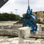 Kenco Bin Block Lift attached to crane for lifting and handling concrete block safely