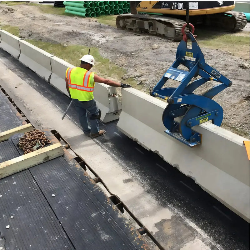Kenco Concrete Barrier Lift in use for safely lifting concrete barriers on a construction site