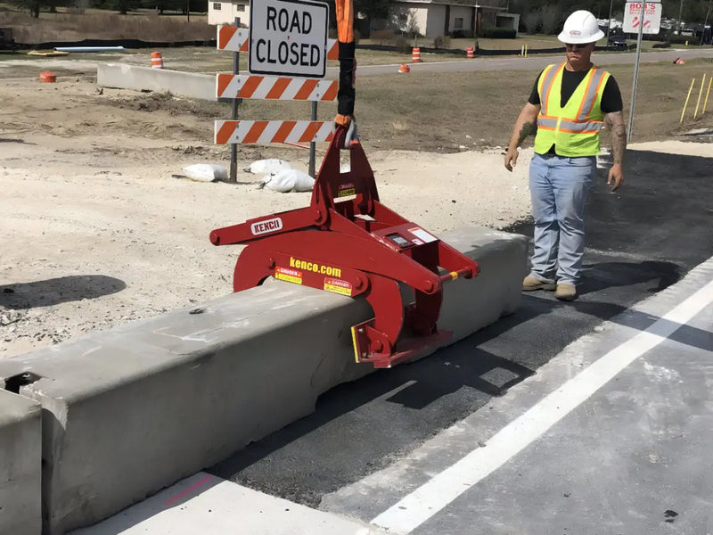 Kenco Concrete Barrier Lift in use, lifting a concrete barrier at a road construction site