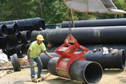 Kenco Concrete Pipe Lift lifting a 4500 lb concrete pipe on a construction site