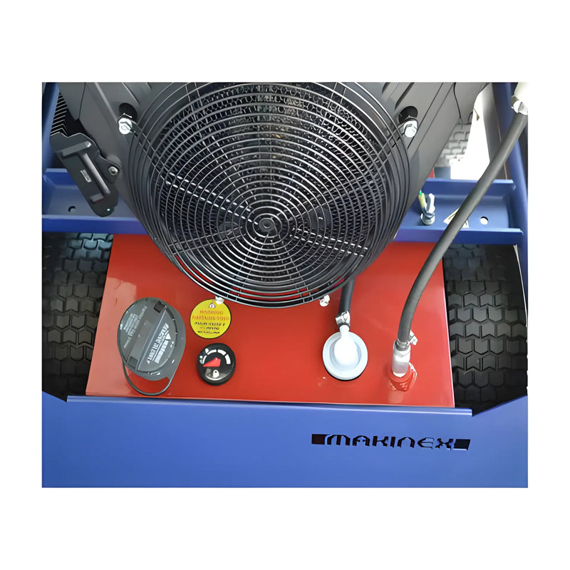 Close-up of Makinex 1212-23kW 480V industrial equipment showing fan and control panel with tires in background