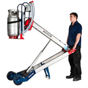 Makinex 5555-Glass lifting trolley with wheels carrying a metal cylinder by a man