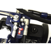 Close-up view of hydraulic connections on Makinex DPW-2500-0A-HU-50 equipment with metal fittings and hoses