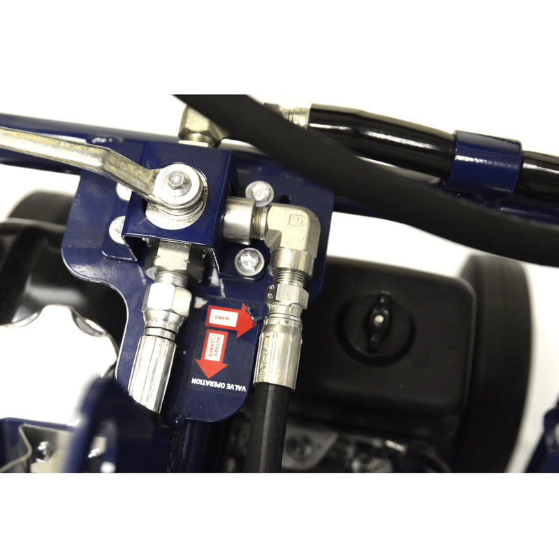 Close-up view of hydraulic connections on Makinex DPW-2500-0A-HU-50 equipment with metal fittings and hoses