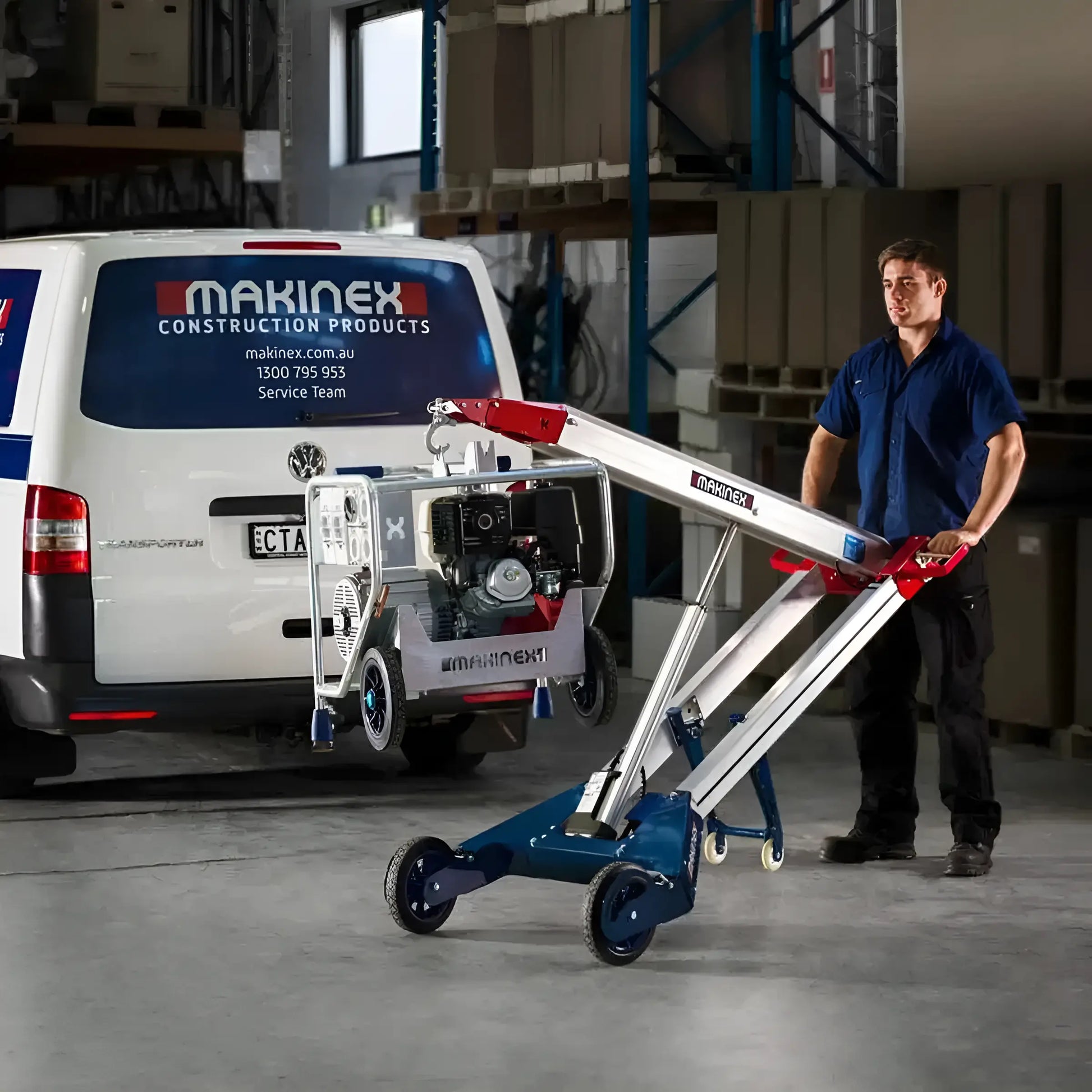 Makinex Powered Hand Truck in use by a worker near a van in a warehouse environment