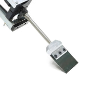 Close-up of Makinex TSHC-SS-US-V2 heavy-duty steel scraper tool with sharp blade and mounting bracket