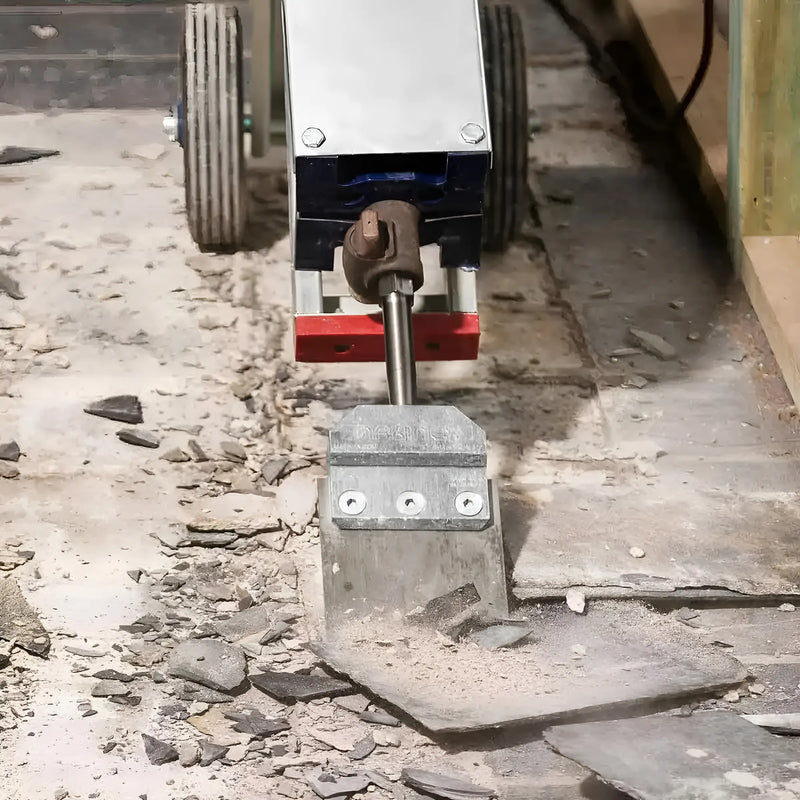 Makinex TSHC-SS-US-V2 heavy-duty concrete scraper removing debris from floor surface