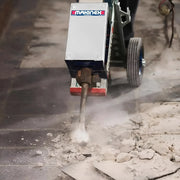 Makinex WCUS-420 heavy-duty floor breaker machine chipping concrete surface with dust
