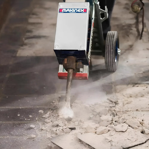 Makinex WCUS-420 heavy-duty floor breaker machine chipping concrete surface with dust