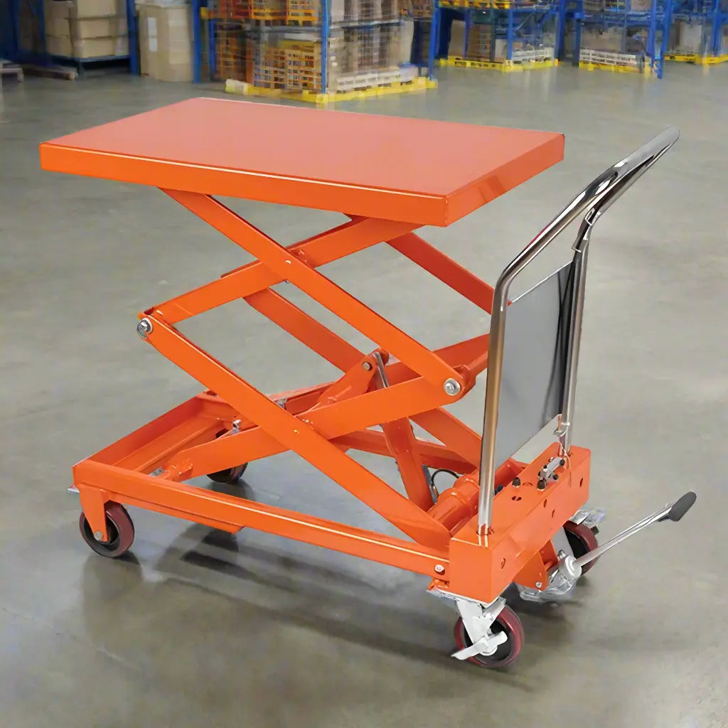 Major Lift orange scissor lift table with wheels and chrome handle on warehouse floor