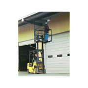 Yellow forklift lifting a worker on a platform fixing overhead lighting with Star Industries 1244B lift