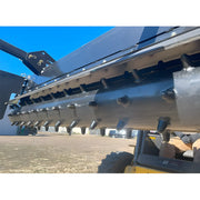 Close-up of Star Industries 130-72 heavy-duty black agricultural equipment with rotary cutting teeth