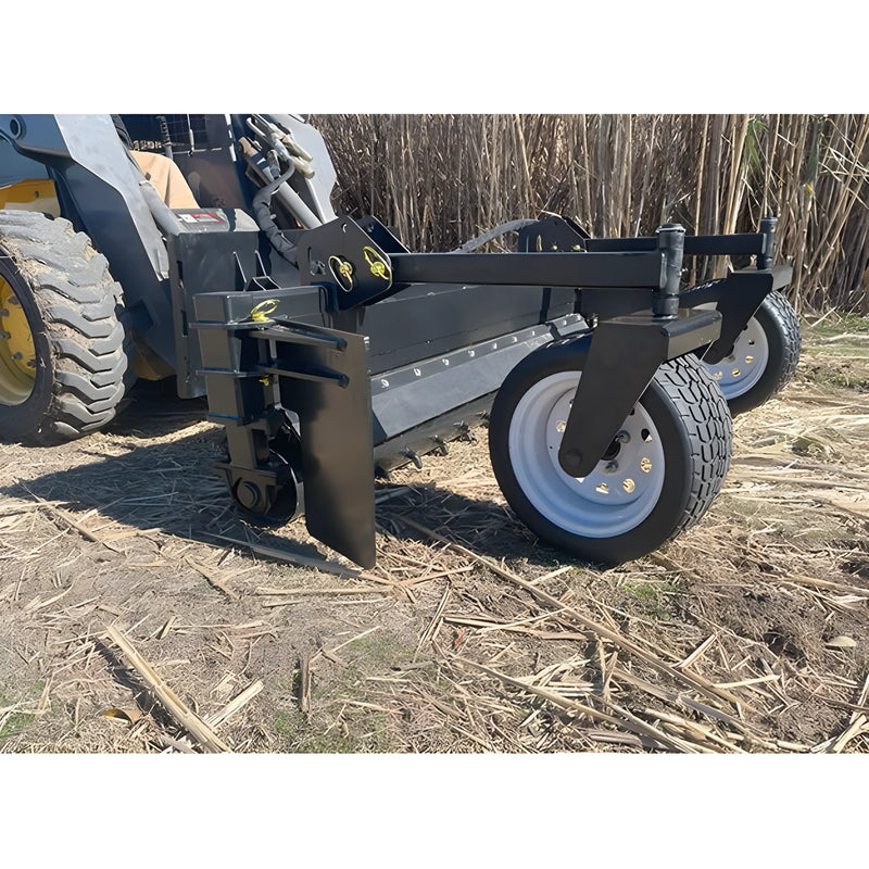 Star Industries 130-72 land leveler attachment with large wheels for skid steer loader in outdoor field
