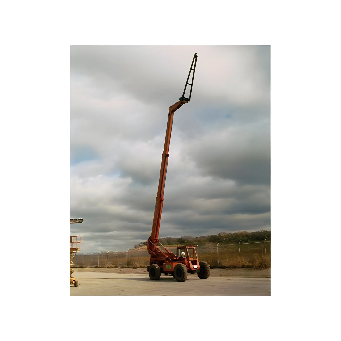 Star Industries 1335 telescopic boom lift in extended position on construction site under cloudy sky