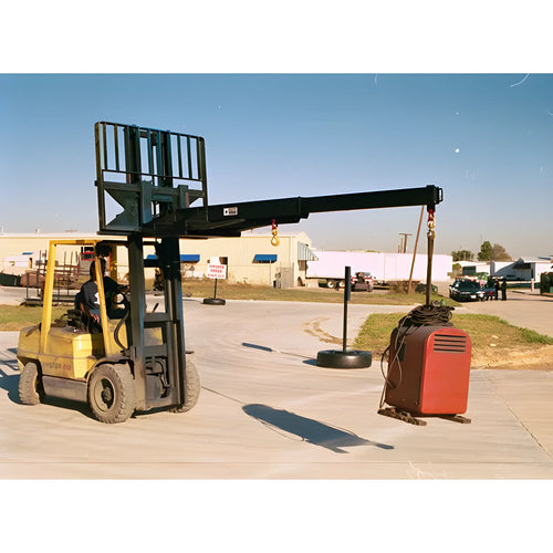 Star Industries 1360B-5FXL forklift with extended boom lifting heavy red equipment outdoors