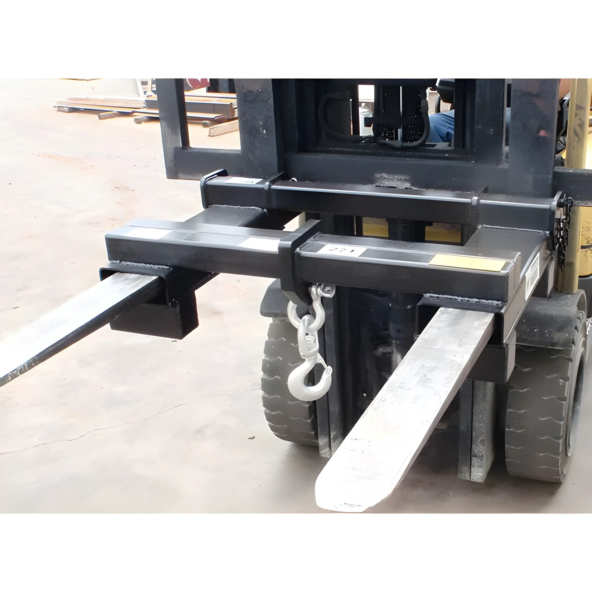 Star Industries 1377 forklift attachment with metal fork extensions and center hook for heavy lifting