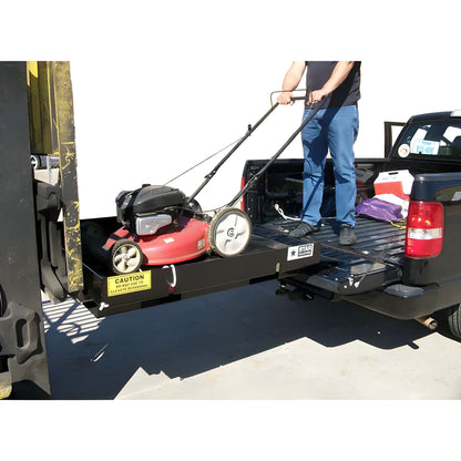 Star Industries 1385 1388 lift loading lawn mower into pickup truck bed with person operating