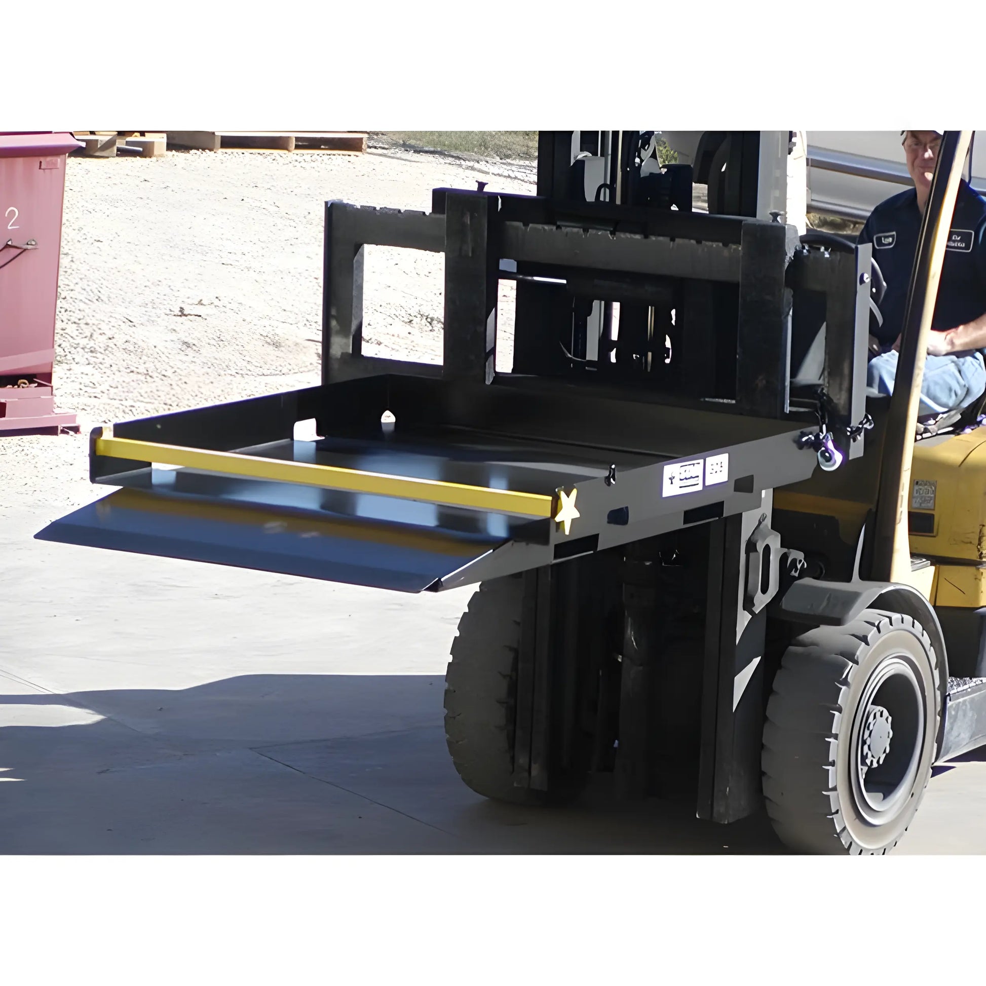 Star Industries 1385 1388 forklift attachment mounted on a forklift for material handling